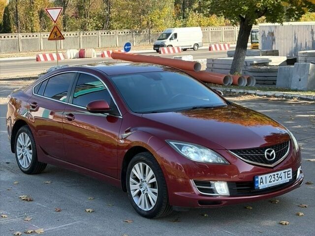 Красный Мазда 6, объемом двигателя 2 л и пробегом 191 тыс. км за 6700 $, фото 1 на Automoto.ua