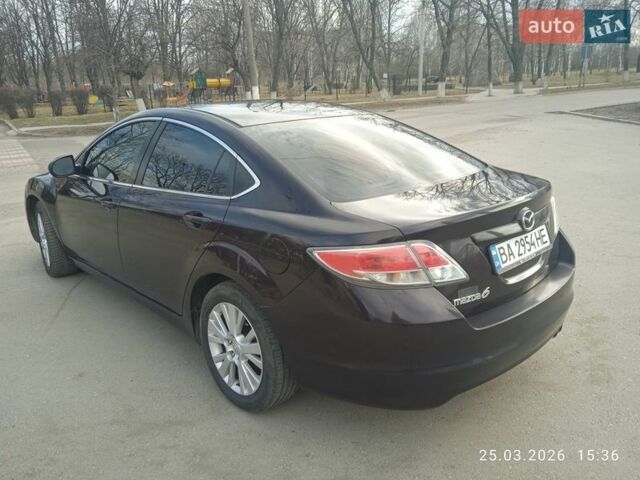 Красный Мазда 6, объемом двигателя 2.49 л и пробегом 317 тыс. км за 7500 $, фото 1 на Automoto.ua