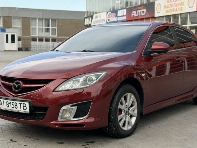 Красный Мазда 6, объемом двигателя 2.5 л и пробегом 300 тыс. км за 6800 $, фото 1 на Automoto.ua