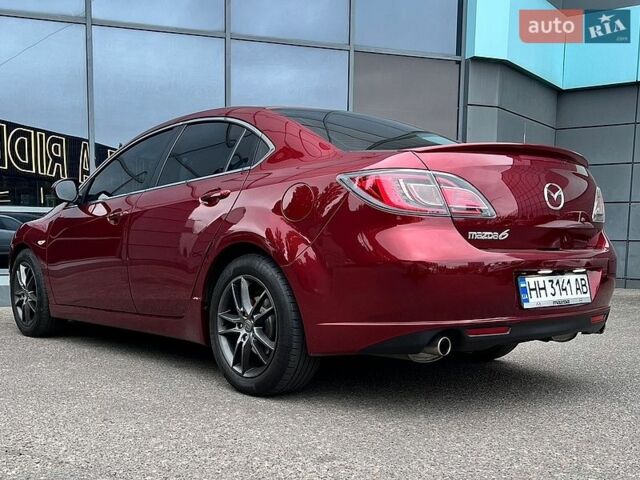 Красный Мазда 6, объемом двигателя 2 л и пробегом 251 тыс. км за 7750 $, фото 1 на Automoto.ua