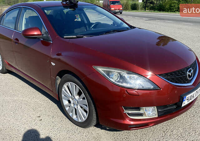 Красный Мазда 6, объемом двигателя 2 л и пробегом 136 тыс. км за 7500 $, фото 1 на Automoto.ua