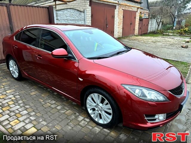 Красный Мазда 6, объемом двигателя 2 л и пробегом 185 тыс. км за 7700 $, фото 1 на Automoto.ua