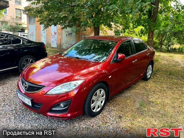 Красный Мазда 6, объемом двигателя 2 л и пробегом 210 тыс. км за 7800 $, фото 1 на Automoto.ua