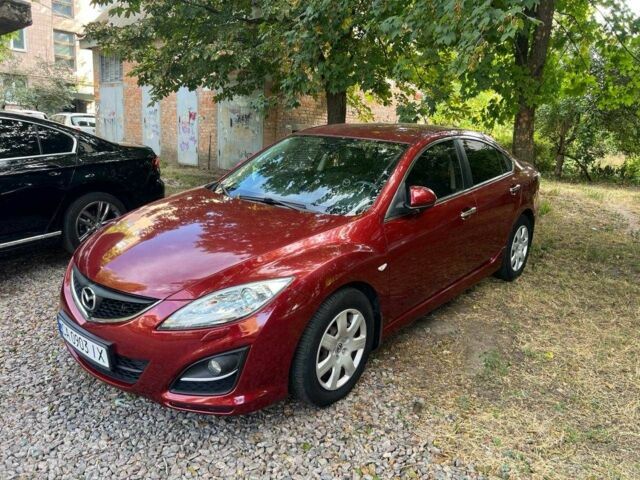 Красный Мазда 6, объемом двигателя 2 л и пробегом 210 тыс. км за 7800 $, фото 1 на Automoto.ua