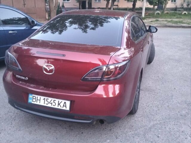Красный Мазда 6, объемом двигателя 1.8 л и пробегом 260 тыс. км за 6600 $, фото 1 на Automoto.ua