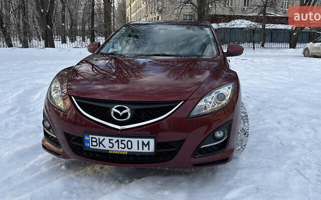 Красный Мазда 6, объемом двигателя 2 л и пробегом 147 тыс. км за 10000 $, фото 1 на Automoto.ua