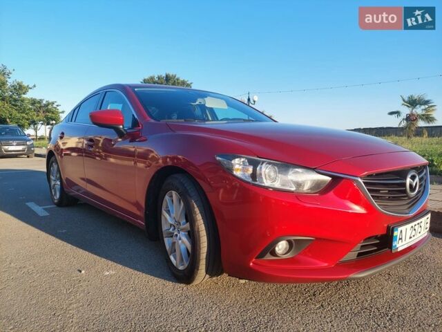 Красный Мазда 6, объемом двигателя 2 л и пробегом 188 тыс. км за 11900 $, фото 1 на Automoto.ua