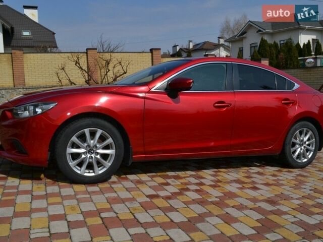 Красный Мазда 6, объемом двигателя 2 л и пробегом 188 тыс. км за 11279 $, фото 1 на Automoto.ua