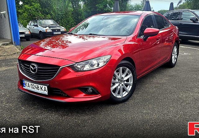 Красный Мазда 6, объемом двигателя 2 л и пробегом 170 тыс. км за 12500 $, фото 1 на Automoto.ua
