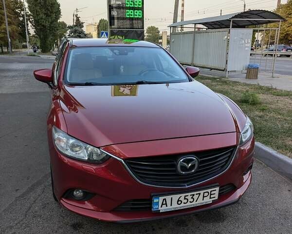 Красный Мазда 6, объемом двигателя 2 л и пробегом 153 тыс. км за 10700 $, фото 1 на Automoto.ua