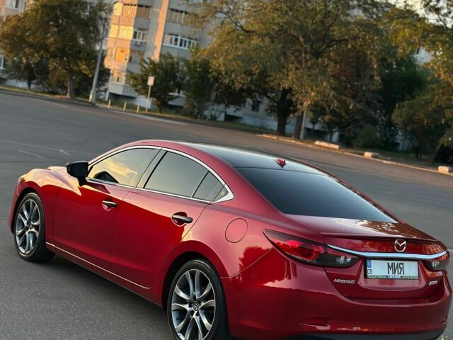 Красный Мазда 6, объемом двигателя 2.5 л и пробегом 128 тыс. км за 12300 $, фото 1 на Automoto.ua