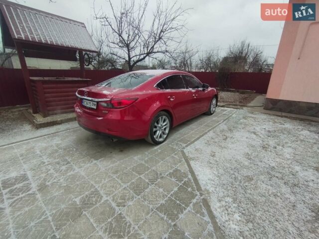 Красный Мазда 6, объемом двигателя 2.49 л и пробегом 130 тыс. км за 11000 $, фото 1 на Automoto.ua