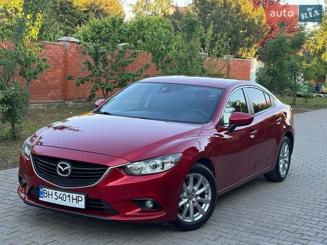 Красный Мазда 6, объемом двигателя 2 л и пробегом 85 тыс. км за 12800 $, фото 1 на Automoto.ua