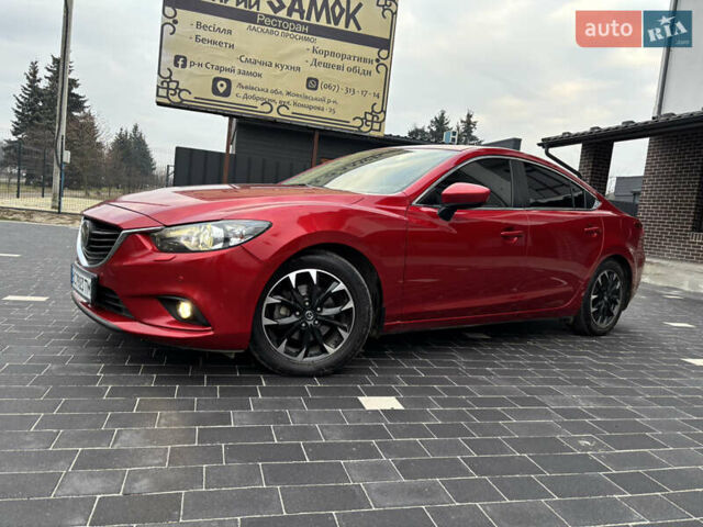 Красный Мазда 6, объемом двигателя 2.49 л и пробегом 175 тыс. км за 12590 $, фото 1 на Automoto.ua