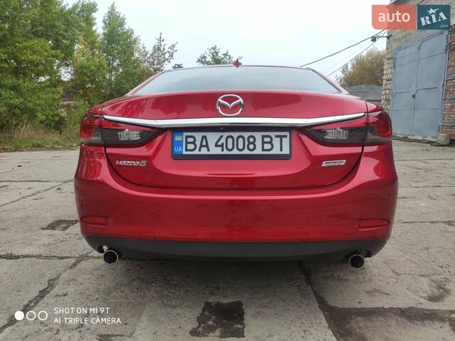 Красный Мазда 6, объемом двигателя 2.5 л и пробегом 120 тыс. км за 13150 $, фото 1 на Automoto.ua