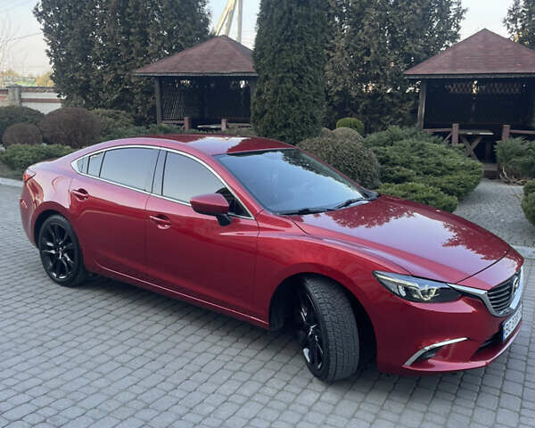 Красный Мазда 6, объемом двигателя 2.49 л и пробегом 155 тыс. км за 15500 $, фото 1 на Automoto.ua