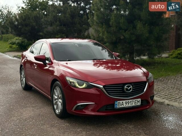 Красный Мазда 6, объемом двигателя 2.19 л и пробегом 152 тыс. км за 12999 $, фото 1 на Automoto.ua