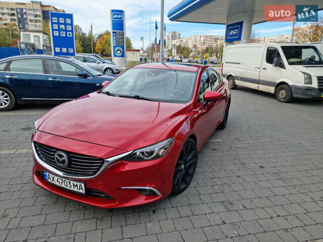 Красный Мазда 6, объемом двигателя 2.49 л и пробегом 320 тыс. км за 12000 $, фото 1 на Automoto.ua