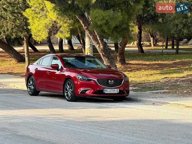 Красный Мазда 6, объемом двигателя 2.49 л и пробегом 215 тыс. км за 13000 $, фото 1 на Automoto.ua