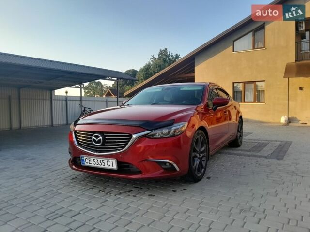 Красный Мазда 6, объемом двигателя 2.4 л и пробегом 278 тыс. км за 12000 $, фото 1 на Automoto.ua