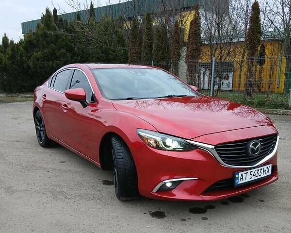 Красный Мазда 6, объемом двигателя 2.49 л и пробегом 157 тыс. км за 13650 $, фото 1 на Automoto.ua
