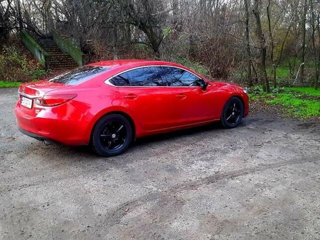 Красный Мазда 6, объемом двигателя 2.5 л и пробегом 147 тыс. км за 13200 $, фото 1 на Automoto.ua