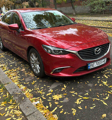 Красный Мазда 6, объемом двигателя 2.19 л и пробегом 143 тыс. км за 15300 $, фото 1 на Automoto.ua