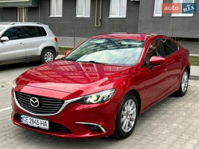 Красный Мазда 6, объемом двигателя 2.19 л и пробегом 63 тыс. км за 14700 $, фото 1 на Automoto.ua