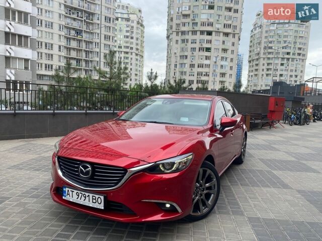 Красный Мазда 6, объемом двигателя 2.19 л и пробегом 136 тыс. км за 15500 $, фото 1 на Automoto.ua