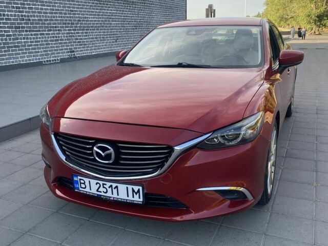 Красный Мазда 6, объемом двигателя 2.5 л и пробегом 170 тыс. км за 13999 $, фото 1 на Automoto.ua