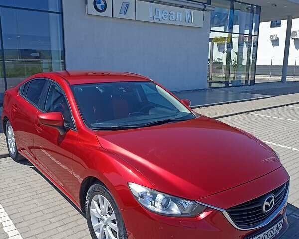 Красный Мазда 6, объемом двигателя 2 л и пробегом 70 тыс. км за 14990 $, фото 1 на Automoto.ua