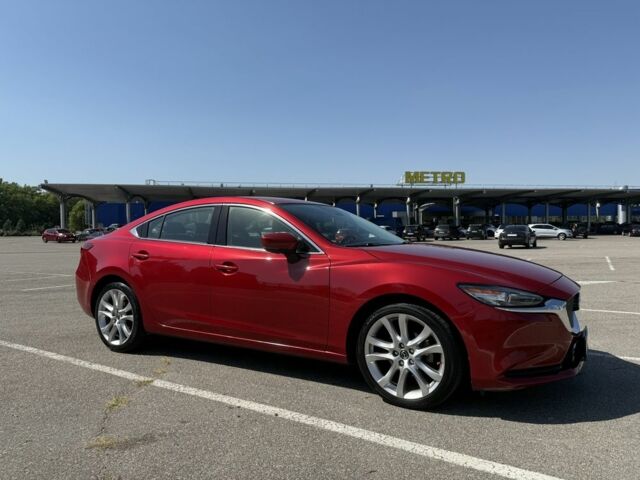 Красный Мазда 6, объемом двигателя 2.5 л и пробегом 104 тыс. км за 13299 $, фото 1 на Automoto.ua