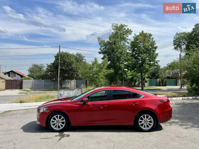 Красный Мазда 6, объемом двигателя 2 л и пробегом 101 тыс. км за 14900 $, фото 1 на Automoto.ua