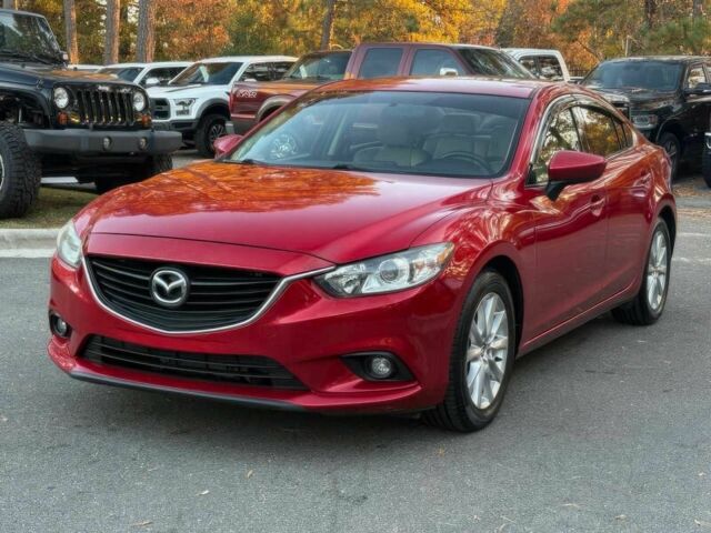 Красный Мазда 6, объемом двигателя 2.5 л и пробегом 74 тыс. км за 10000 $, фото 1 на Automoto.ua