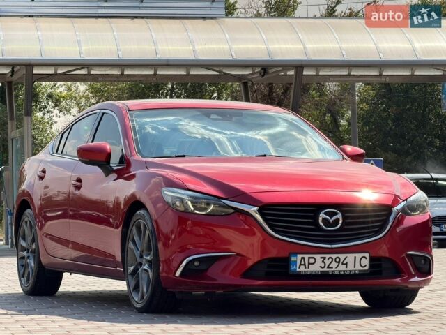 Красный Мазда 6, объемом двигателя 2.5 л и пробегом 125 тыс. км за 12550 $, фото 1 на Automoto.ua