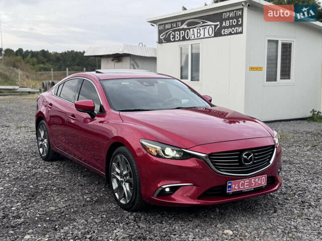 Красный Мазда 6, объемом двигателя 2.5 л и пробегом 106 тыс. км за 15500 $, фото 1 на Automoto.ua
