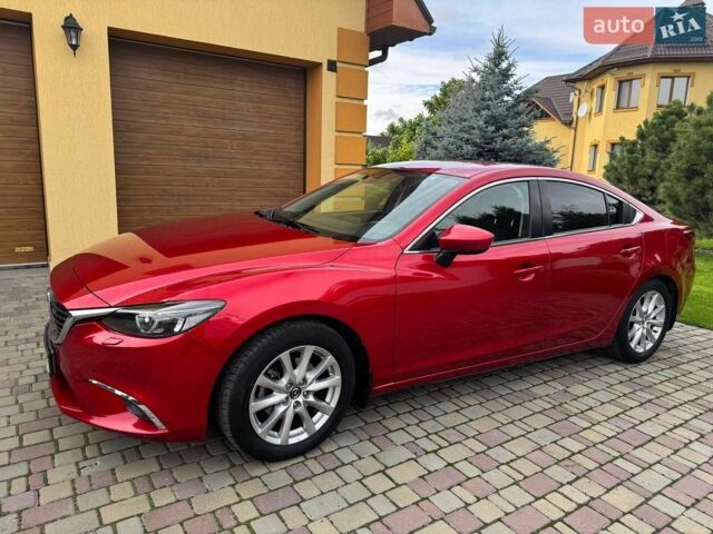 Красный Мазда 6, объемом двигателя 2.2 л и пробегом 63 тыс. км за 16000 $, фото 1 на Automoto.ua