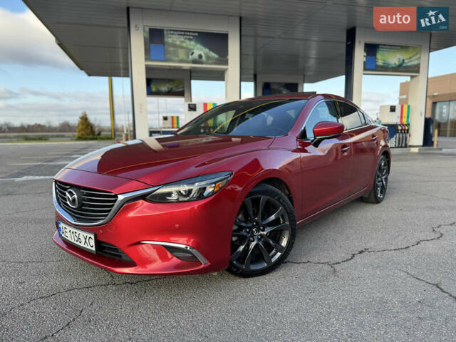 Красный Мазда 6, объемом двигателя 2.49 л и пробегом 145 тыс. км за 13650 $, фото 1 на Automoto.ua