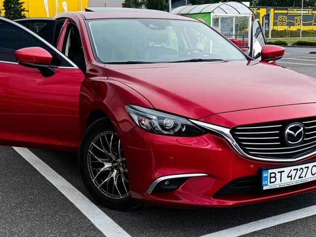 Красный Мазда 6, объемом двигателя 2.49 л и пробегом 70 тыс. км за 19500 $, фото 1 на Automoto.ua