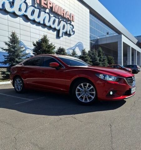 Красный Мазда 6, объемом двигателя 2 л и пробегом 52 тыс. км за 17999 $, фото 1 на Automoto.ua