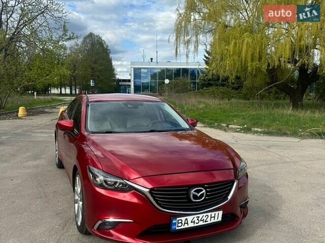 Красный Мазда 6, объемом двигателя 2.49 л и пробегом 101 тыс. км за 14500 $, фото 1 на Automoto.ua