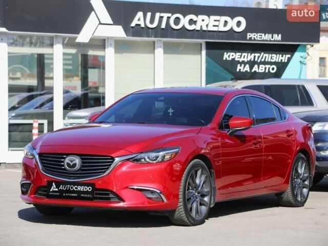Красный Мазда 6, объемом двигателя 2.49 л и пробегом 150 тыс. км за 17900 $, фото 1 на Automoto.ua