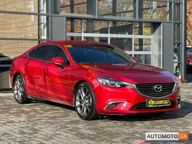 Красный Мазда 6, объемом двигателя 2.5 л и пробегом 102 тыс. км за 18800 $, фото 1 на Automoto.ua