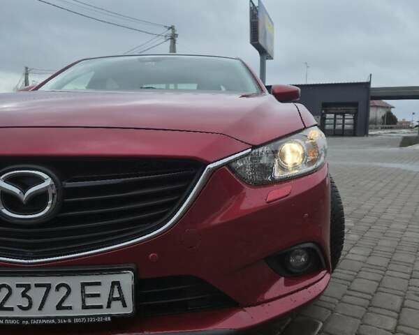 Красный Мазда 6, объемом двигателя 2 л и пробегом 102 тыс. км за 13500 $, фото 1 на Automoto.ua