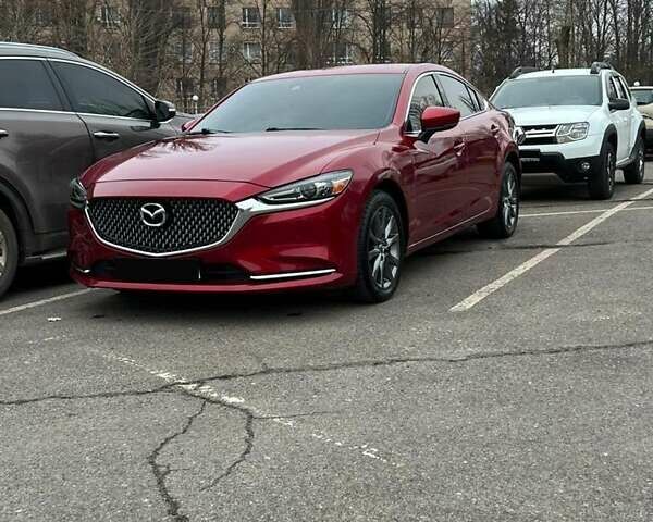 Красный Мазда 6, объемом двигателя 2.49 л и пробегом 57 тыс. км за 15900 $, фото 1 на Automoto.ua