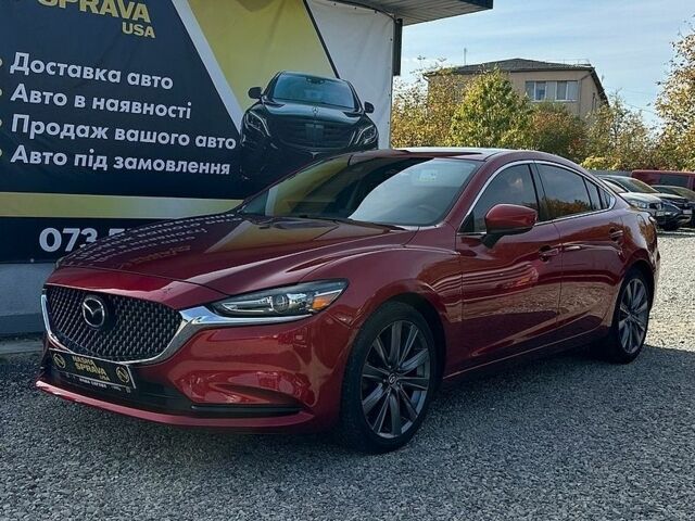 Красный Мазда 6, объемом двигателя 2.49 л и пробегом 120 тыс. км за 16500 $, фото 1 на Automoto.ua