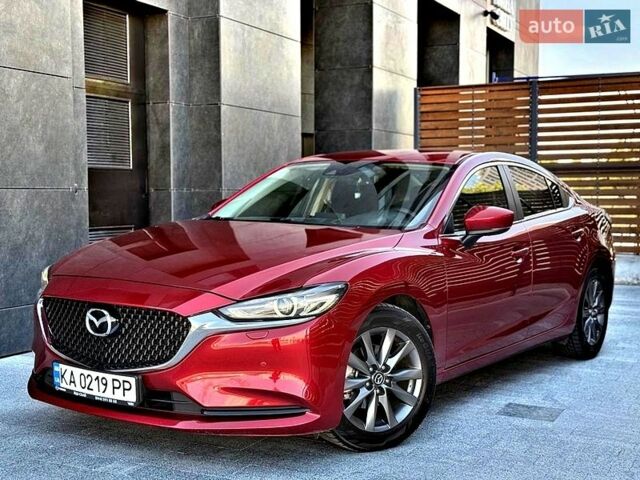 Красный Мазда 6, объемом двигателя 2 л и пробегом 125 тыс. км за 17900 $, фото 1 на Automoto.ua