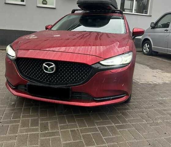 Красный Мазда 6, объемом двигателя 2.5 л и пробегом 99 тыс. км за 13000 $, фото 1 на Automoto.ua