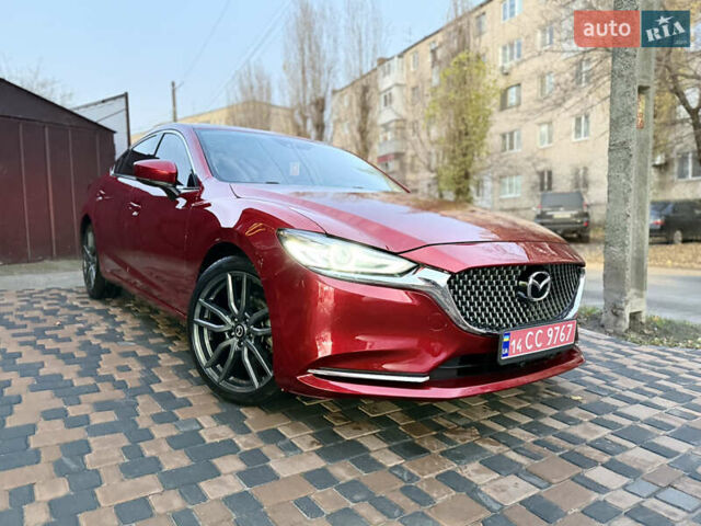 Красный Мазда 6, объемом двигателя 2.5 л и пробегом 97 тыс. км за 14500 $, фото 1 на Automoto.ua