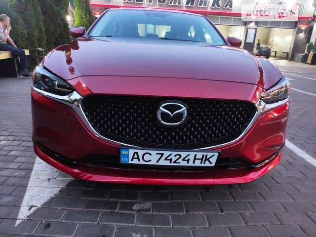 Красный Мазда 6, объемом двигателя 2.49 л и пробегом 105 тыс. км за 17999 $, фото 1 на Automoto.ua